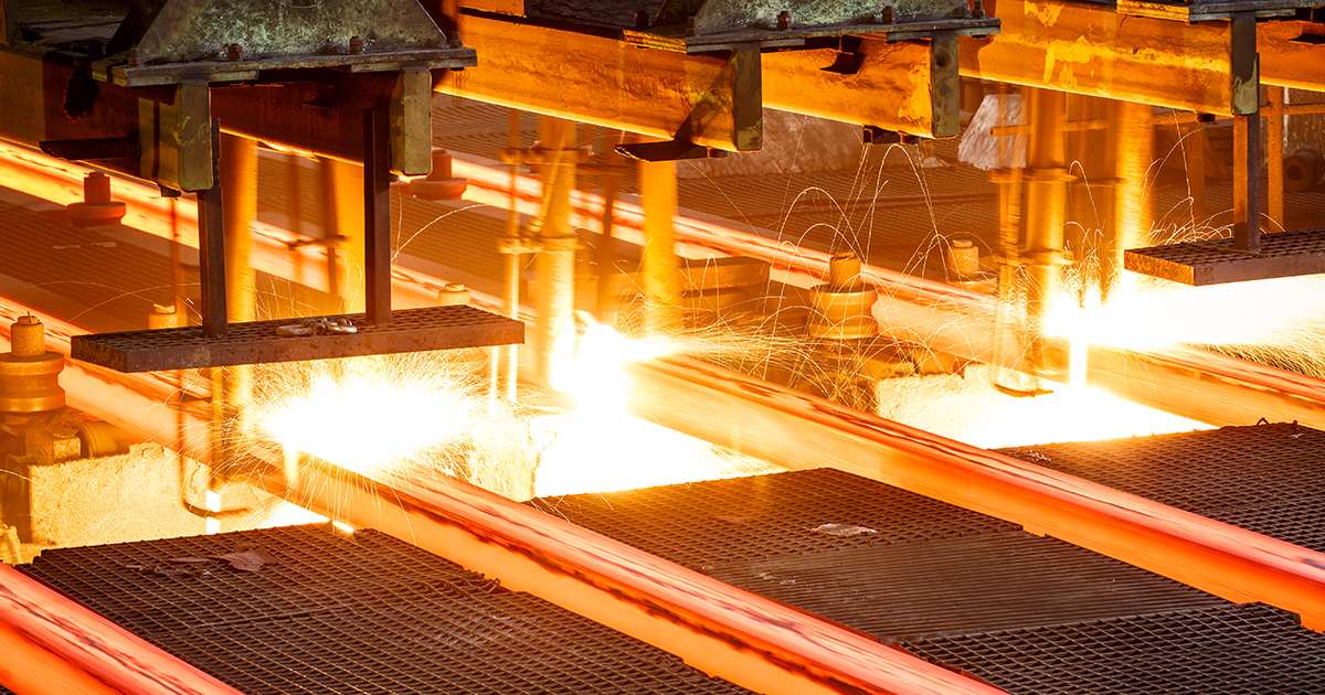 Hot steel on a conveyor belt optimised using a CSE W Arthur Fisher Variable Speed Drive solution. 