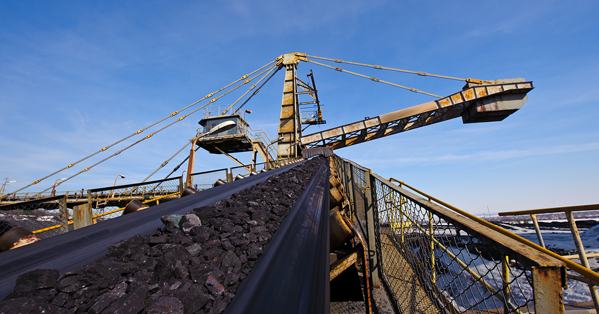 Conveyer belt optimised using a CSE W Arthur Fisher Variable Speed Drive solution sends iron ore to a warehouse from the minesite. 