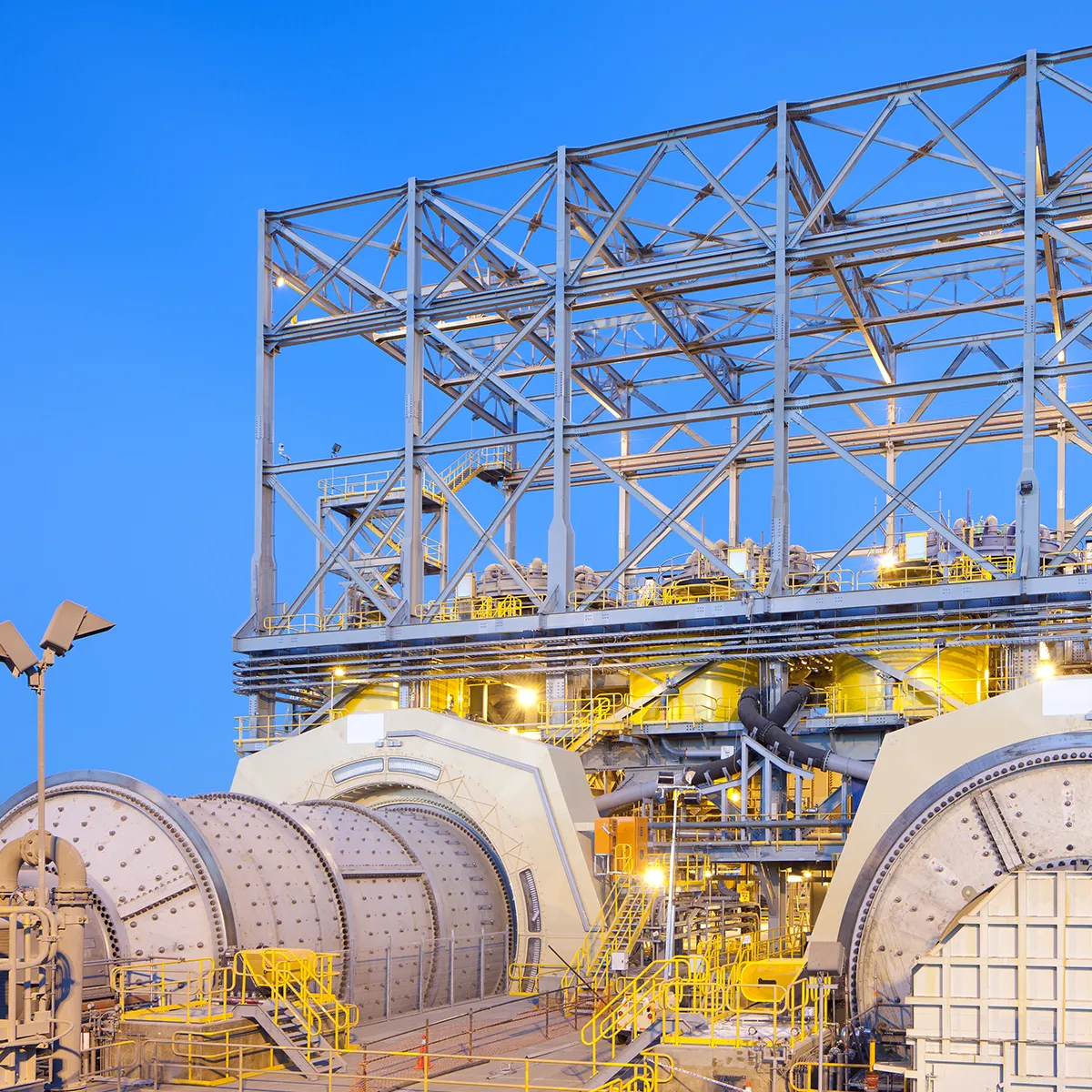 Ball Mill at dawn that uses a non-nuclear density measurement solution to deliver precise readings without the regulatory burden of radioactive gauges.
